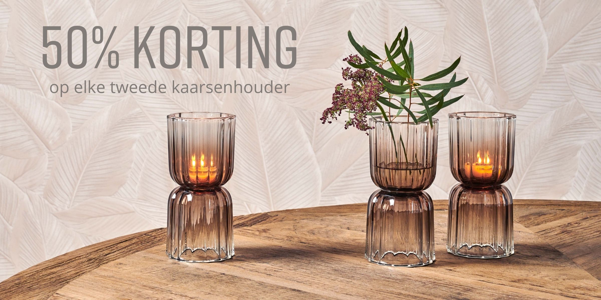 50% korting op de tweede kaarsenhouder